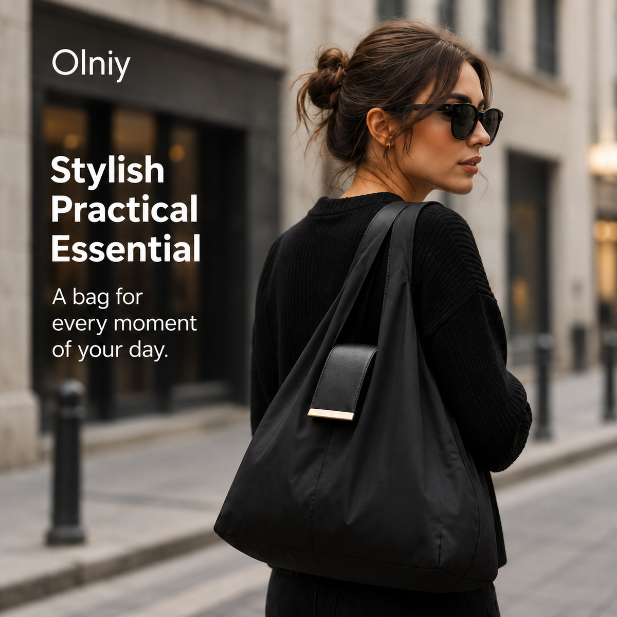 Woman carrying the black Olniy tote on the street